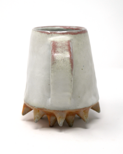 Spiked-bottom mug