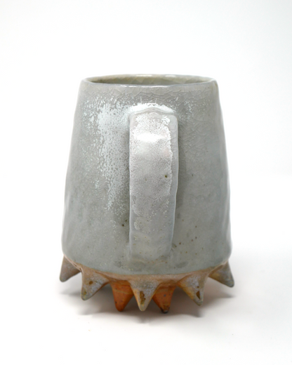 Spiked-bottom mug